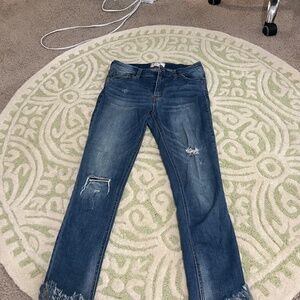Free People size 27 medium wash jeans. Lightly distressed.